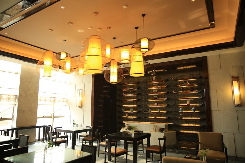 Ramada Yiyang Taojiang Hotel ภายนอก รูปภาพ